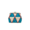 Clipbörse mit beigen und blauen Dreiecken und Silberakzenten